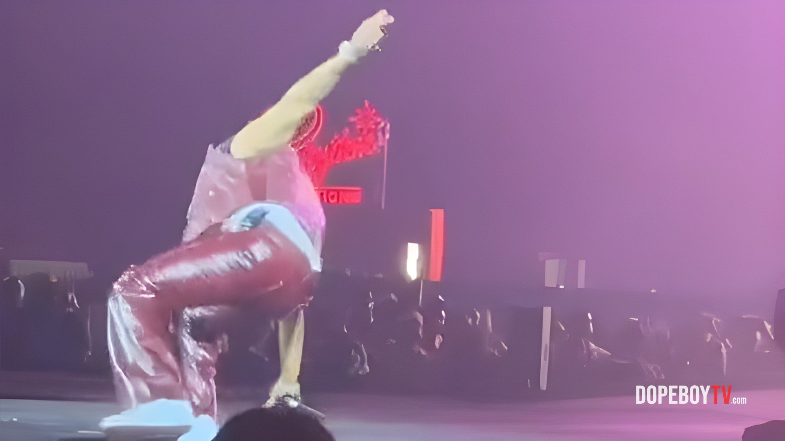 Fans accuse Usher of causing Mario's stage slip by spilling alcohol during their tour.