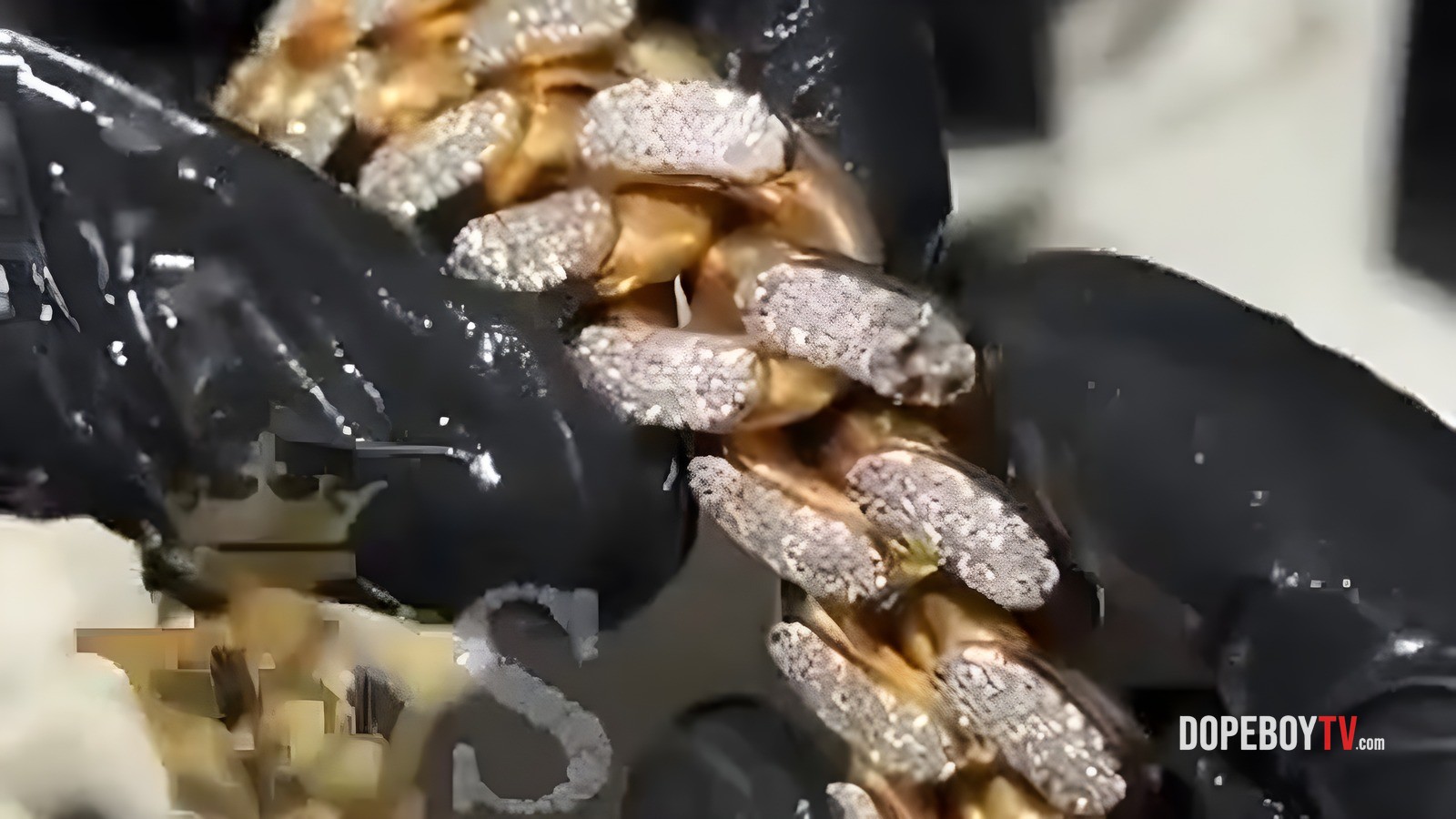 Jeweler Cleans Dead Rapper's Bloody Q50 Chains While Showing Bullet Damage